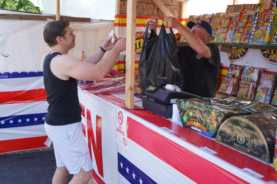 Customer checking out  at the TNT Fireworks Stand